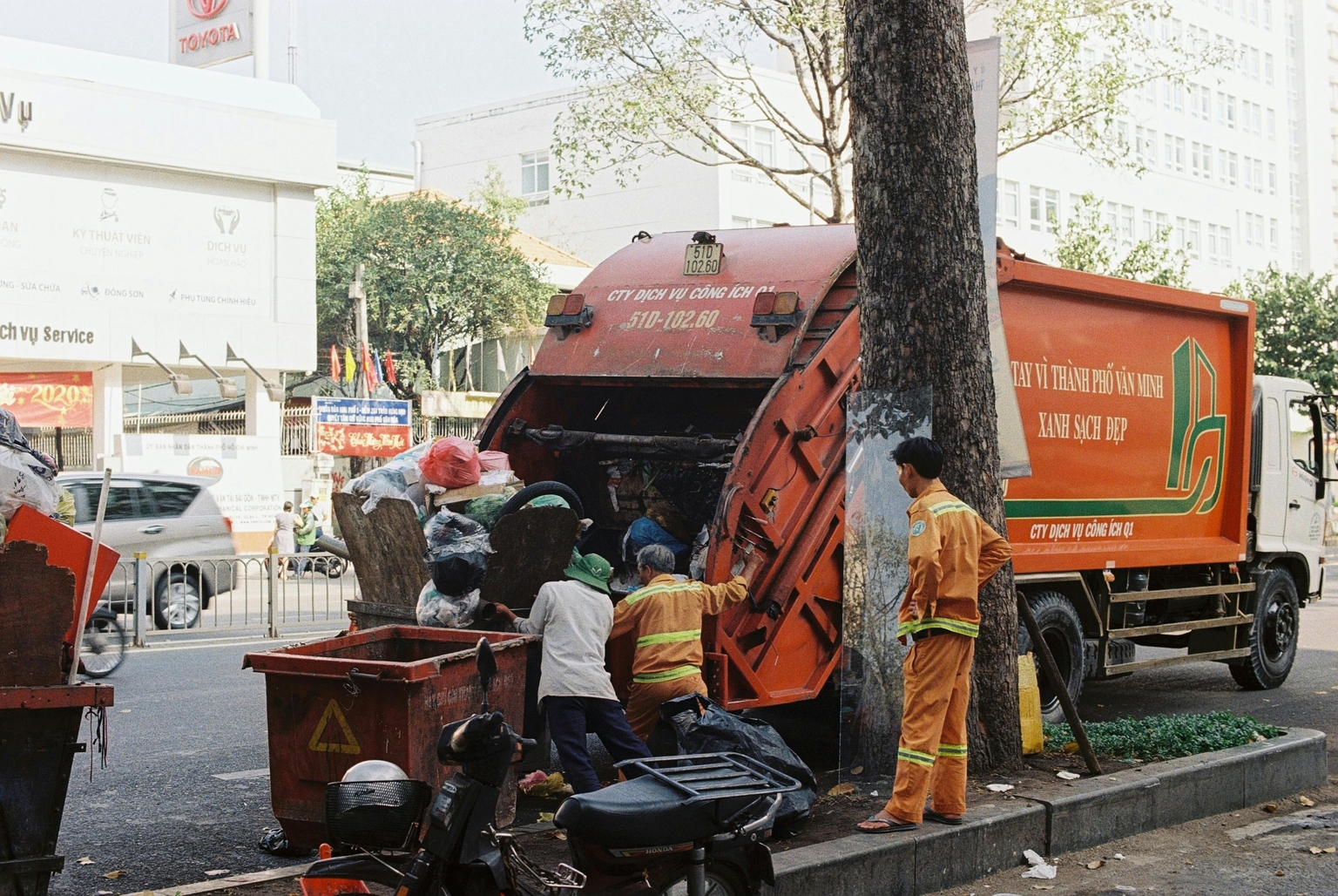 Citizens and sanitation teams collaborating on waste management
